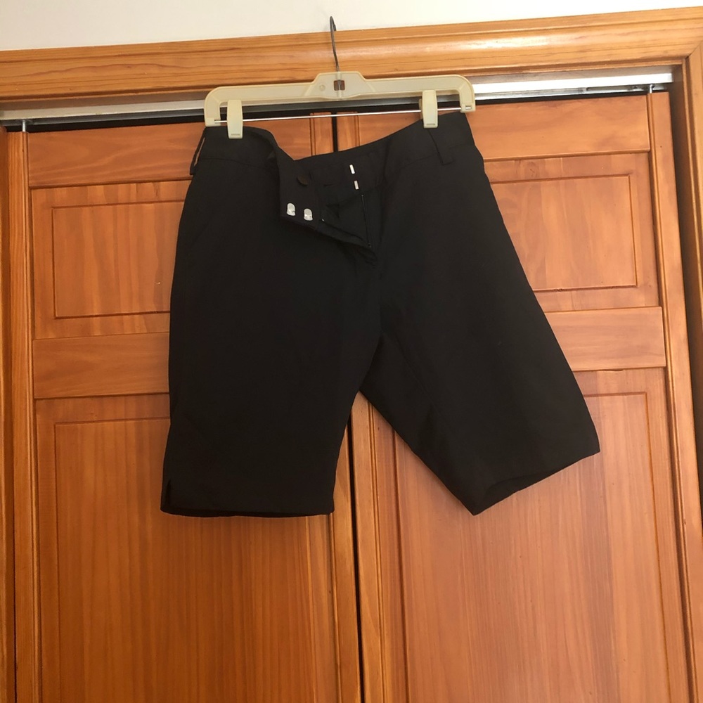 Black golf shorts